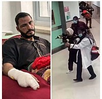 A photo of journalist Hassan Aslih during his treatment at Nasser Hospital two months before the fire in the journalists' camps...and a photo...of Israeli soldiers wearing medical uniforms to kill the young man Basil Al-Ghazawi while he was in his hospital room.