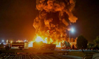 An explosion lights up the sky over Kyiv amid a Russian attack on the Ukrainian capital.