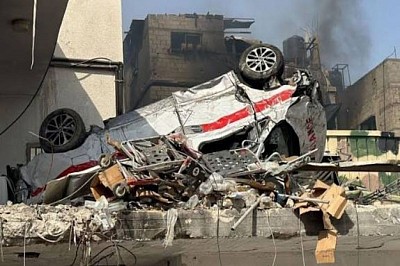A photo shows a truck overturning in Gaza that killed 72 people.