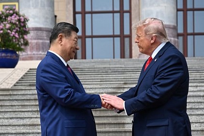 US President Donald Trump's visit to China, where he was received by Chinese President Xi Jinping.