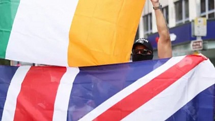 Images of the flags of Northern Ireland and Britain