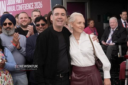 Andy Burnham arrived in Liverpool with his wife, Mary Frances Van Heel.